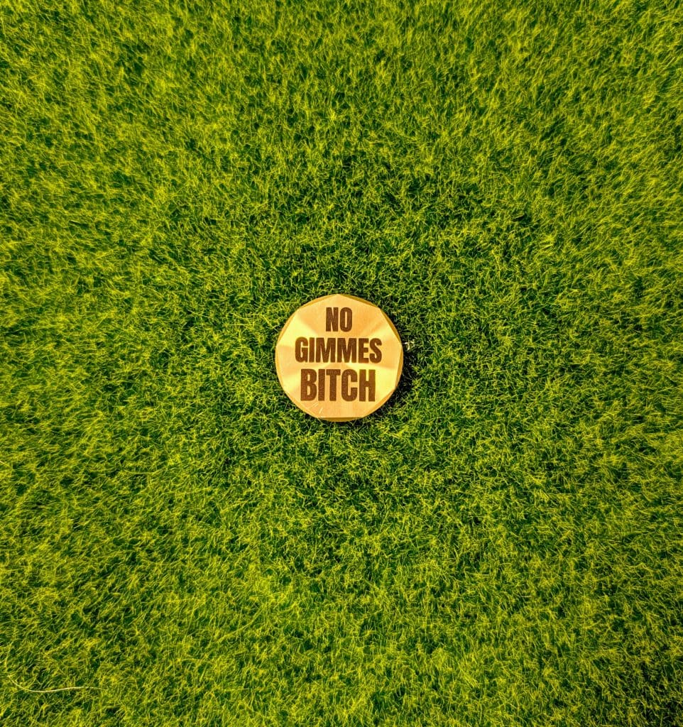 no gimmes bitch brass ball marker 2 white knuckle golf